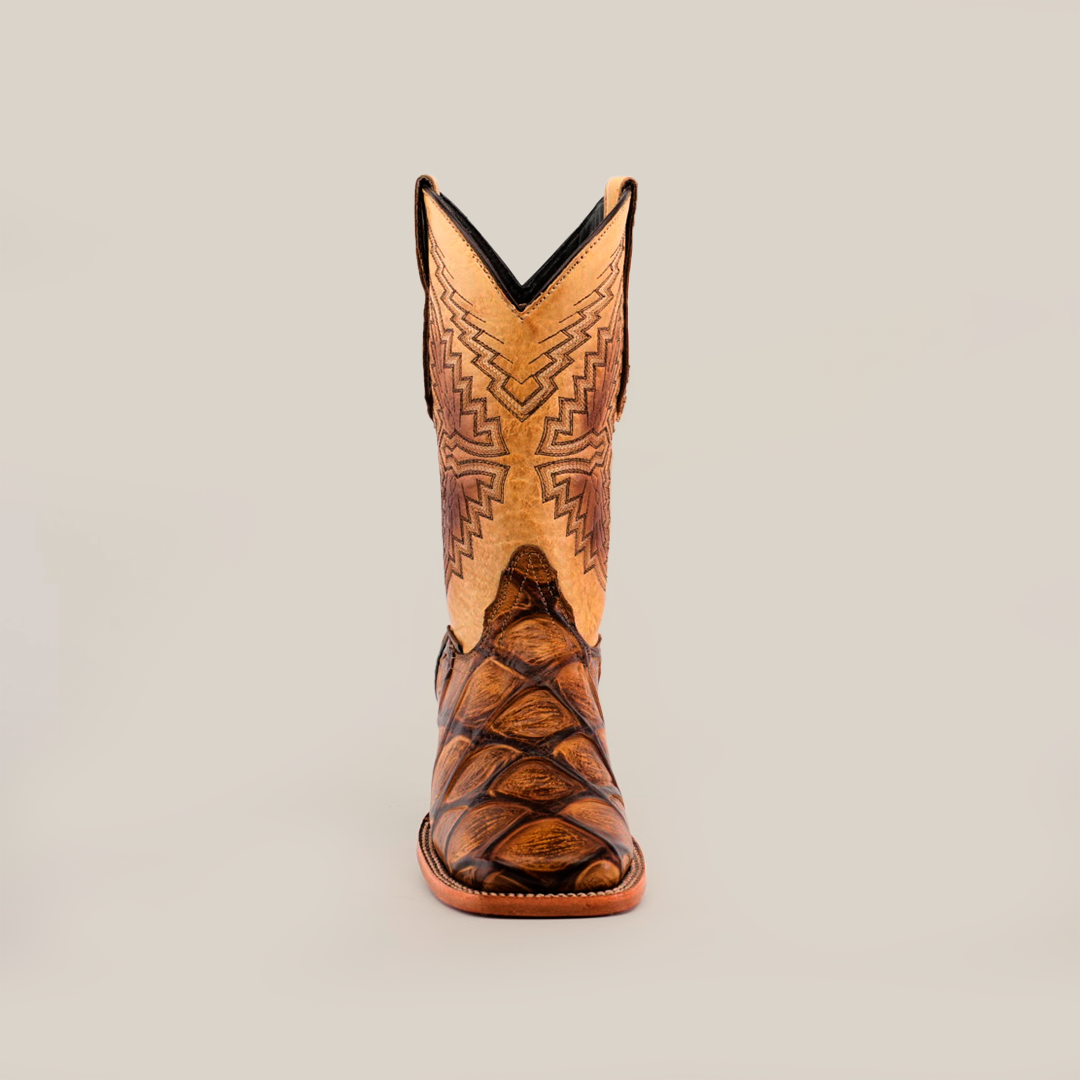 Front view of the Big Bass Pirarucu Print Orix - Square Toe against a plain background, showcasing intricate patterns on a gold upper and brown textured lower section made from premium cowhide leather. Its distinctive square toe enhances the stylish design.