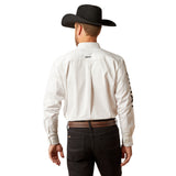 A man in a Team Logo Twill Classic Fit Shirt White (10046825) with embroidered details pairs it with a black cowboy hat and jeans, fastened by a brown leather belt. The back view reveals a logo on the shirts upper back and text on the left sleeve.