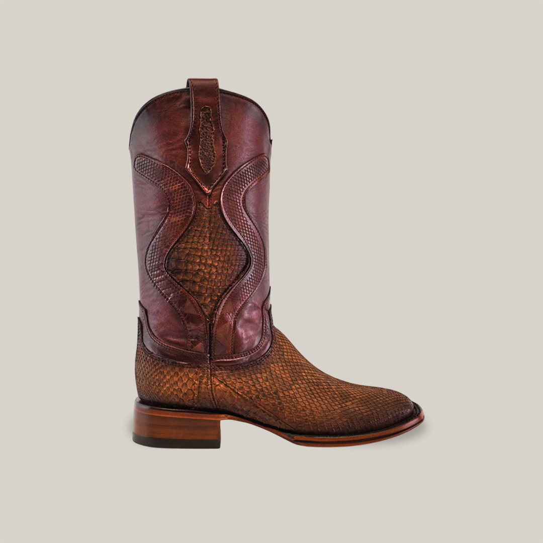 An Exotic Python - Diamond - Tamarindo Square Toe cowboy boot with a brown leather upper featuring a detailed pattern and a light brown textured lower half is displayed against a plain white background. It includes a stacked heel.