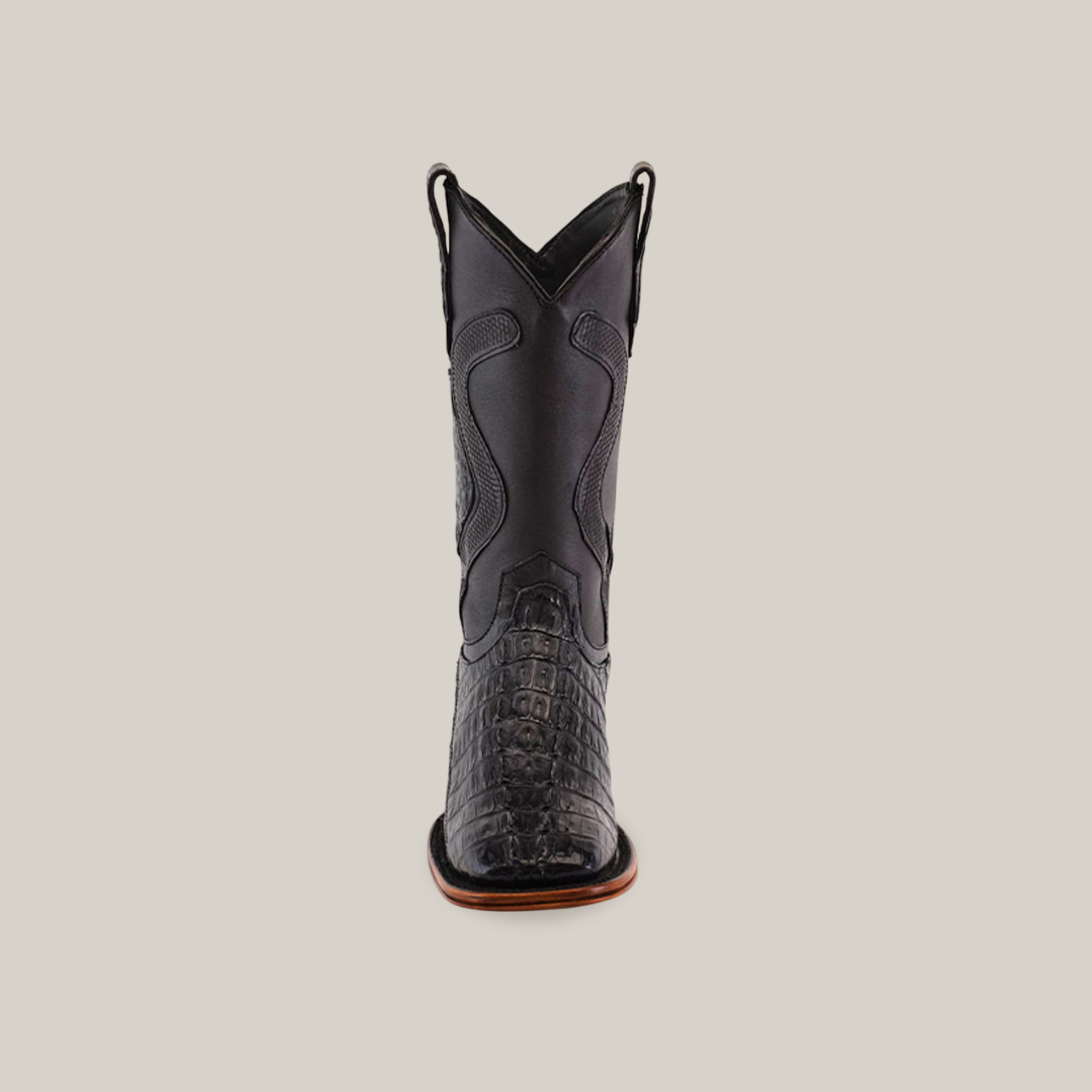 Front view of the Exotic Caiman Tail - Diamond black square toe cowboy boot, featuring a crocodile texture on the foot and detailed stitching on the shaft. Part of the Platinum Collection, displayed against a plain light gray background.