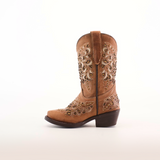 The Kiara Crystals Fawn boot, a single brown cowboy boot with intricate floral embroidery, is made from premium leather. It boasts a snip toe, low heel, and pull-on design, all showcased on a plain white background to emphasize its elegant craftsmanship.