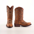 The Carola Tabaco - Snip Toe, premium brown leather cowboy boots with intricate white embroidery on the shafts and toes, are placed side by side against a plain white background.