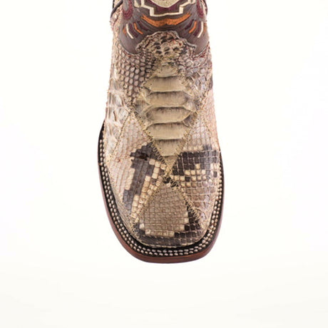 Close-up of the Exotic Python Patchwork Natural Square Toe cowboy boot, crafted from premium python leather with intricate patterns. It features a mix of textures in tan, brown, and cream tones and detailed stitching along the sole edge, enhancing its unique character.