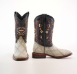 The Exotic American Alligator Patchwork Bone Square Toe cowboy boots flaunt a square toe and intricate red, orange, and beige tribal patterns on a black shaft. Its foot area displays textured design with light colors and patchwork details, completed with a wooden heel and sole.