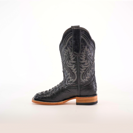 The Caiman Hornback Print Black Square Toe boot, crafted from premium materials with intricate stitching, features a brown sole and medium heel. It is elegantly showcased on a plain white background.