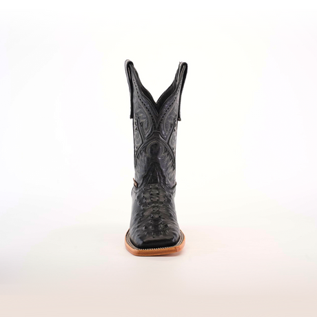 A front-view of a single black leather cowboy boot with intricate patterns and a Caiman Hornback print on the shaft, featuring premium materials, light brown sole, and pointed toe against a plain white background. Product: Caiman Hornback Print Black Square Toe.