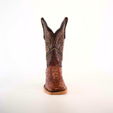 A single chocolate cowboy boot, made from premium materials, stands upright against a plain white background. It features intricate stitching and patterns with a distinctive Karoo Ostrich Print, square toe, and tall shaft.