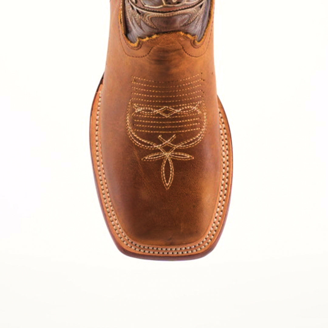 The Cater Honey Square Toe boots feature a top view with intricate toe stitching and showcase superior craftsmanship. The premium leather displays a natural tan, complemented by lighter beige stitching for added contrast and distinction.