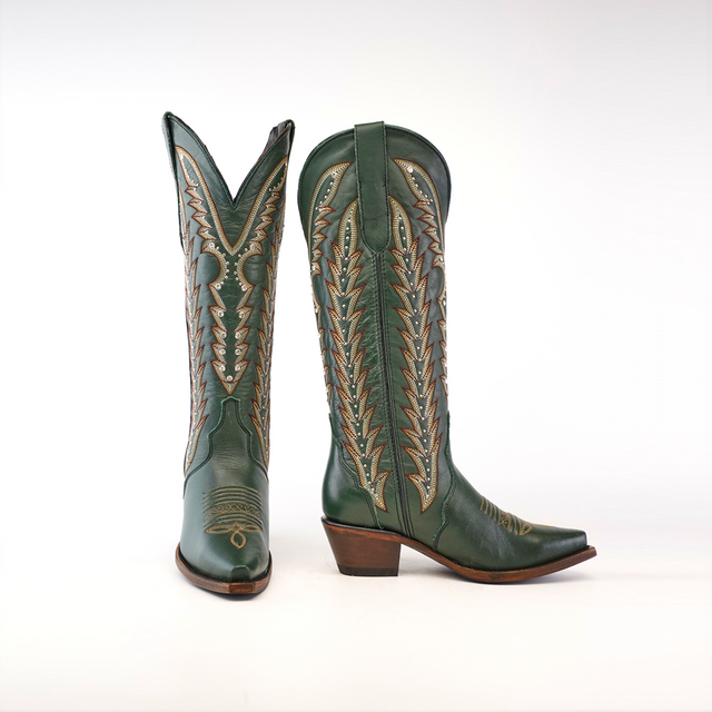 Introducing the Madona Forest Green boots: tall, handcrafted leather cowboy boots with intricate beige stitching. The left boot is angled to show the front, while the right displays the side. Featuring classic snip toes and wooden heels on a pristine white background.