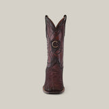 The Brown Elephant Laser & Embroidery - Square Toe - CU848 boot is displayed upright against a plain backdrop, showcasing intricate stitching, laser-engraved patterns, and a distinct logo on the shaft, with a square toe and slightly distressed leather.