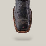 A close-up of the Blackcherry Ostrich Laser & Embroidery boot (CU786) showcases its square toe, exotic textured leather with laser-engraved details, and a brown stitched border against a light gray background.