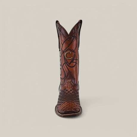 The Over Honey Laser & Embroidery & Woven - Square Toe - CU500 cowboy boot showcases intricate patterns and laser detailing on the shaft and toe, with a distinct C emblem, highlighted against a plain, light background.