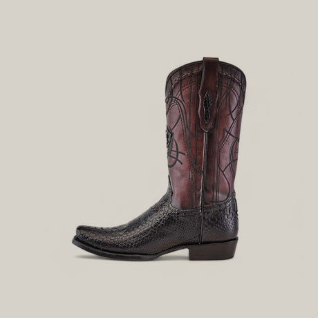 The Plunge Black Python Laser & Embroidery cowboy boot, model CU607, showcases a dark brown textured lower and rich brown upper with decorative stitching. It features laser engraving, a pull tab, a narrow square toe, and a low heel against a plain light gray background.