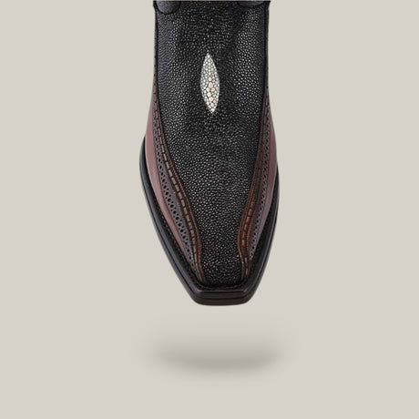 The Black Stingray Laser - Narrow Square Toe CU628 features a detailed laser-engraved design. It boasts a black textured upper with a white diamond-shaped accent centered and brown exotic leather sides, all set against a neutral background.