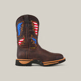 The Taurus Moka Soft Toe - E6189 cowboy boot showcases a brown design with red, white, and blue American flag patterns on the shaft, wing-like side designs, contrasting stitching, and a thick black sole. Perfect for anyone wanting stylish yet durable Texas Country Work Boots.