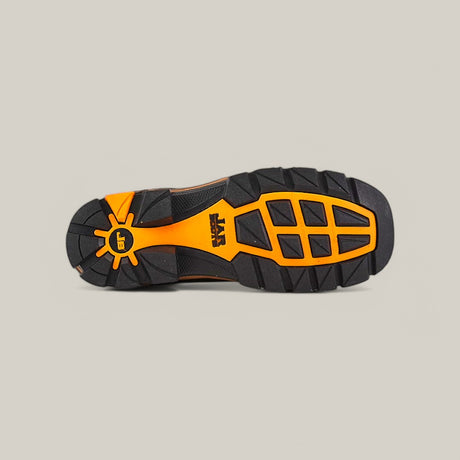 The image highlights the rugged tread pattern of the Amazonas Tanger Composite Toe - E6257 sole, featuring Texas Country Work Boots black and orange hues. The prominent logo underscores its durability and traction, making it perfect for outdoor adventures.