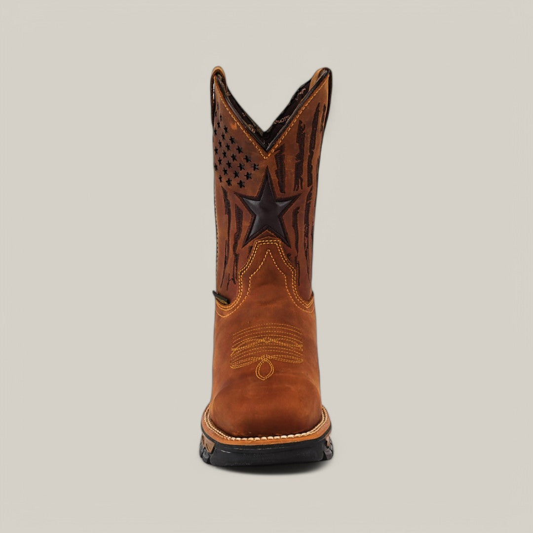 The Amazonas Honey Composite Toe - E6259 is a single brown cowboy boot with an American flag design on the shaft, featuring stars and stripes. It includes tan stitching and a round toe, offering durability for any occasion. Set against a plain grey background, its both stylish and reliable.