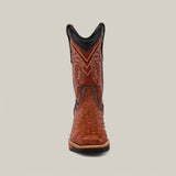 A front view of the Ostrich Print Cogñac Composite Toe - E6022 boot reveals a wide shaft and round toe with decorative stitching. Known for durability, it features a reddish heel and textured brown leather, set against a plain gray background.