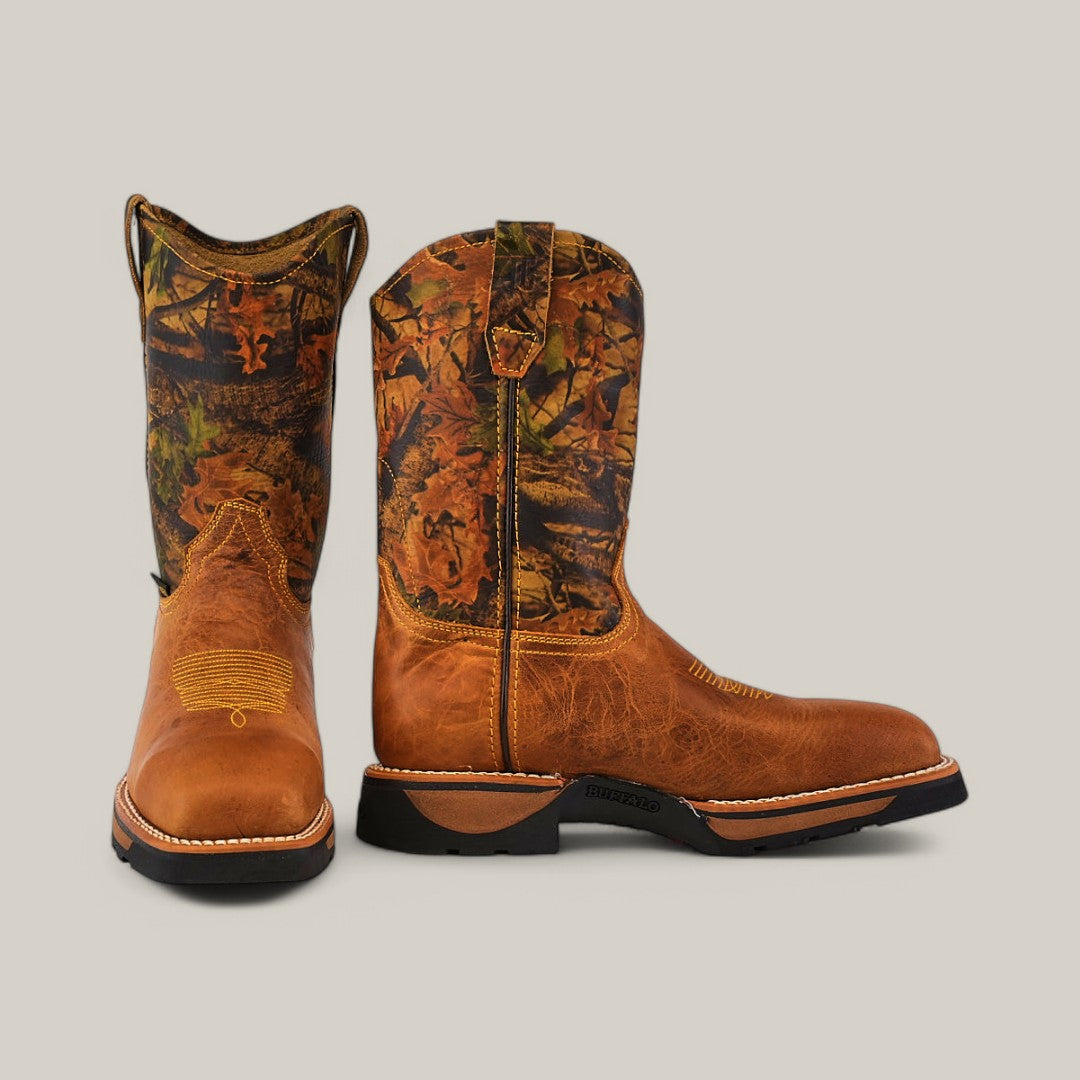 The Alazan Sand Composite Toe - E6081 cowboy boots feature a brown leather foot with a multicolored camouflage-patterned shaft. One boot stands upright, and the other is angled to showcase its rugged texture and stitching details, emphasizing durability for any tough workday.