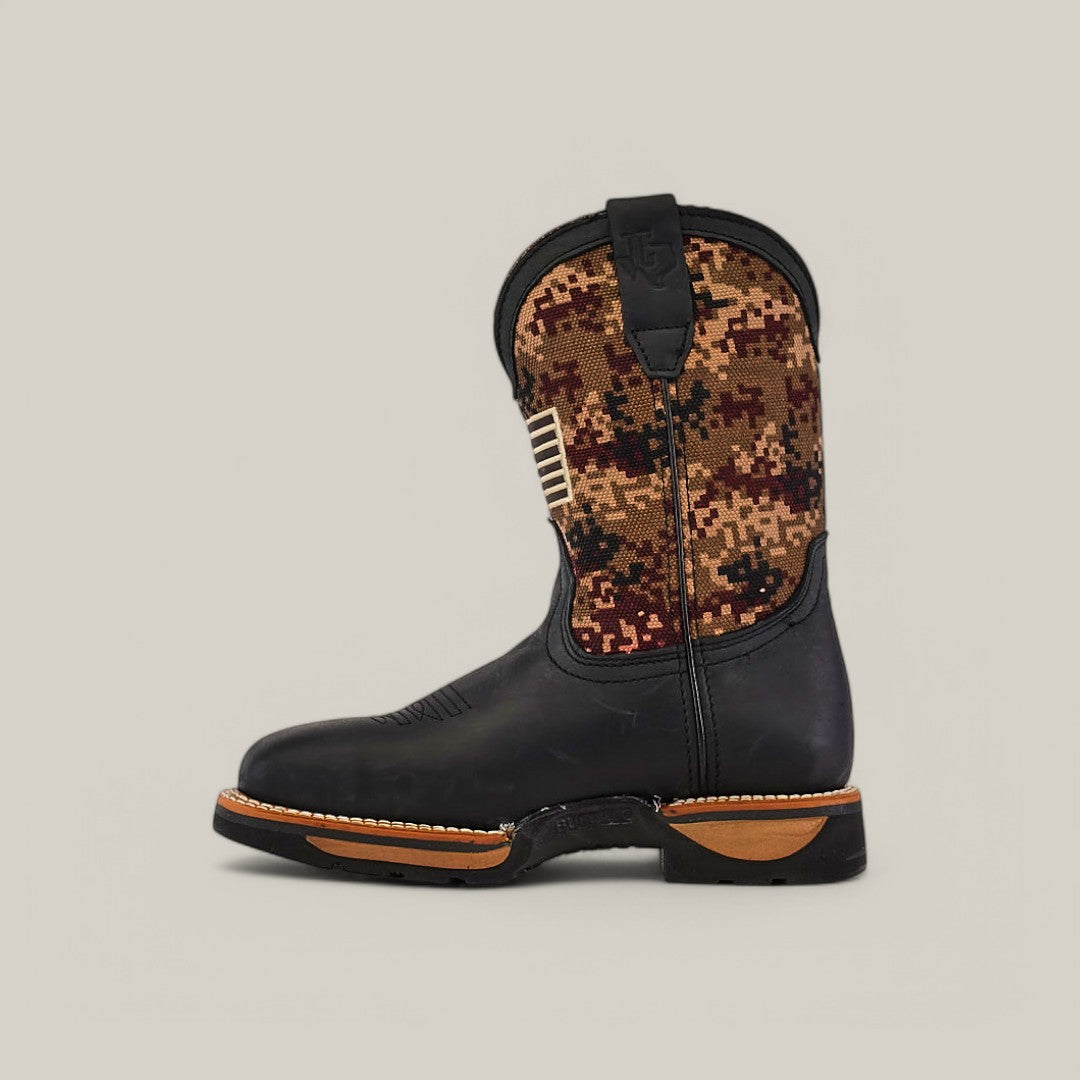 Featuring Texas Country Work Boots style, the Crazy Black Soft Toe - E6185 is a durable cowboy boot with a black leather foot, brown digital camo-patterned shaft, black pull tab, orange heel details, and rugged sole, showcased in side view against a plain beige background.