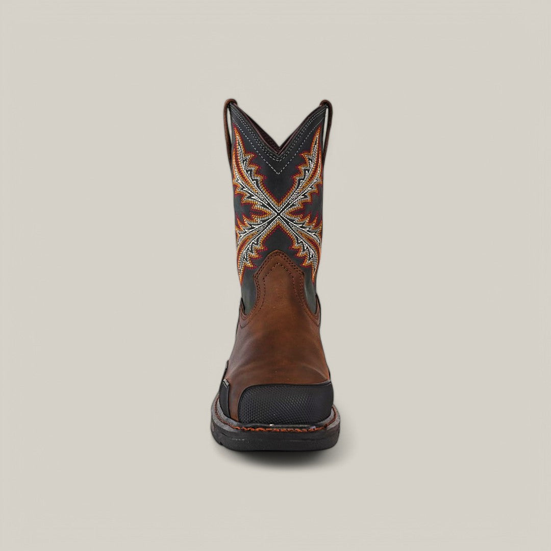 The Overdrive Brown Wide Square Toe boot (Product 10053644) showcases a front view with a decorative shaft featuring geometric shapes in orange, yellow, and blue. It has a rounded toe, black sole, and is set against a plain beige background.