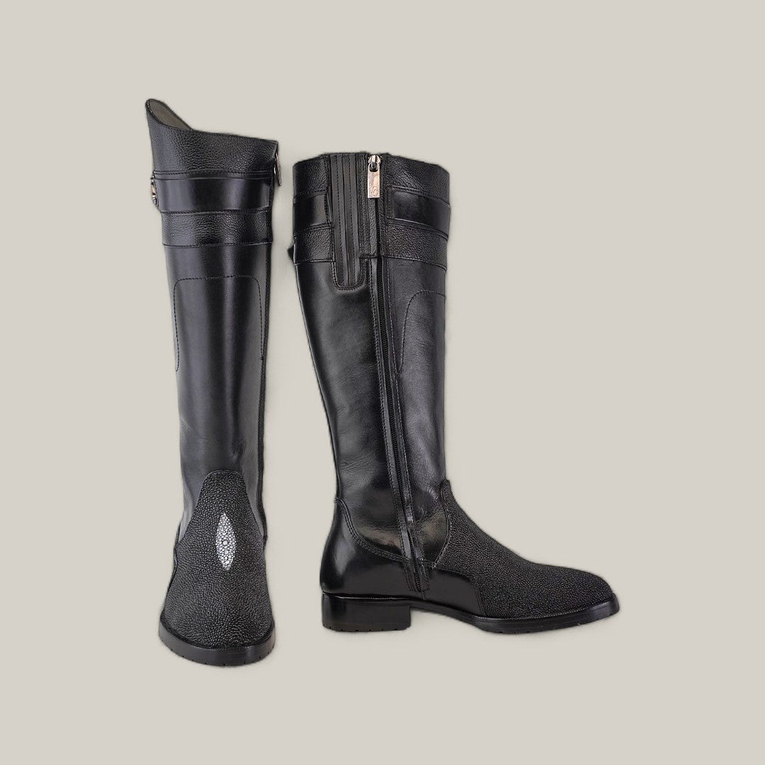 A pair of tall, sleek Black Stingray Zipper boots (Round Toe - FC637), one upright and the other lying down, showcase an inner-side zipper and elegant stingray leather with a subtle textured design on the front.