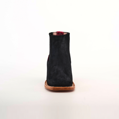 The Prime Suede Black Square Toe, a black suede ankle boot with a cowboy flair featuring a square toe and brown leather sole, is photographed from the front against a plain white background.