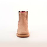 The Prime Suede Sand Square Toe ankle boot is shown facing forward on a white background, highlighting its smooth texture and contrasting red interior lining—ideal for any fashion-forward wardrobe.