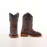 A pair of intricately designed Alligator Head Print Rustic Honey Square Toe cowboy boots crafted from the finest leather with a texture like alligator skin. The boots feature detailed stitching, embodying western fashion, with one boot slightly in front on a plain white background.