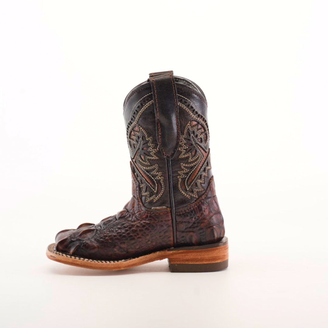 The Alligator Head Print Rustic Honey Square Toe cowboy boot features intricate embroidery and a unique alligator claw design at the toe, crafted from premium leather, on a plain white background.