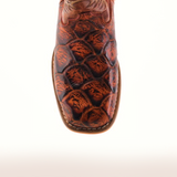 Close-up of the Pirarucu Bass Print Cogñac Square Toe cowboy boot, featuring premium reddish-brown leather with a unique Pirarucu bass print. The square toe design and visible stitching reflect expert craftsmanship on a simple light backdrop.