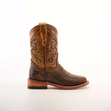 The Azkar Tan Square Toe cowboy boot, crafted in rich cowhide leather with intricate shaft stitching, is displayed against a white background. Its sole and heel have a natural wooden finish, showcasing artisanal craftsmanship.