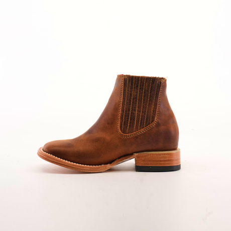 The Avejentado Honey Square Toe ankle boot, made from genuine brown leather, features a stylish elastic side panel and a low wooden heel, all displayed against a plain white background.