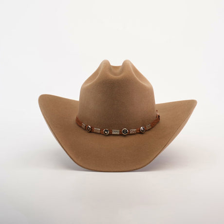 The 6X Country Fawn is a light brown felt cowboy hat featuring a wide brim and a leather band with silver conchos, set against a plain white background.