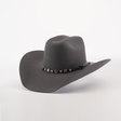 The 6X Bull Oxford, a luxurious gray felt cowboy hat with a wide brim and a decorative band adorned with small round metal accents, is elegantly displayed against a plain white background.