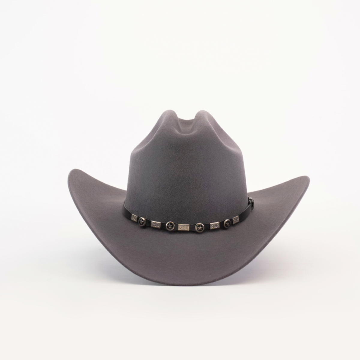 The 100X Sinaloa Oxford is a wide-brimmed, dark gray cowboy hat made from sheeps wool with a notable crown crease. It has a decorative band adorned with round and rectangular metallic accents, capturing its Western essence, all set against a plain white background.