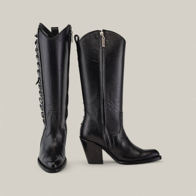 From the Platinum Collection, the Francia Rings Tall Shaft Black - J Toe cowboy boots boast stylish details like a visible side zipper on the right boot and a decorative chain on the left. With tall shafts, pointed toes, and chunky heels, these black leather boots are true standouts.