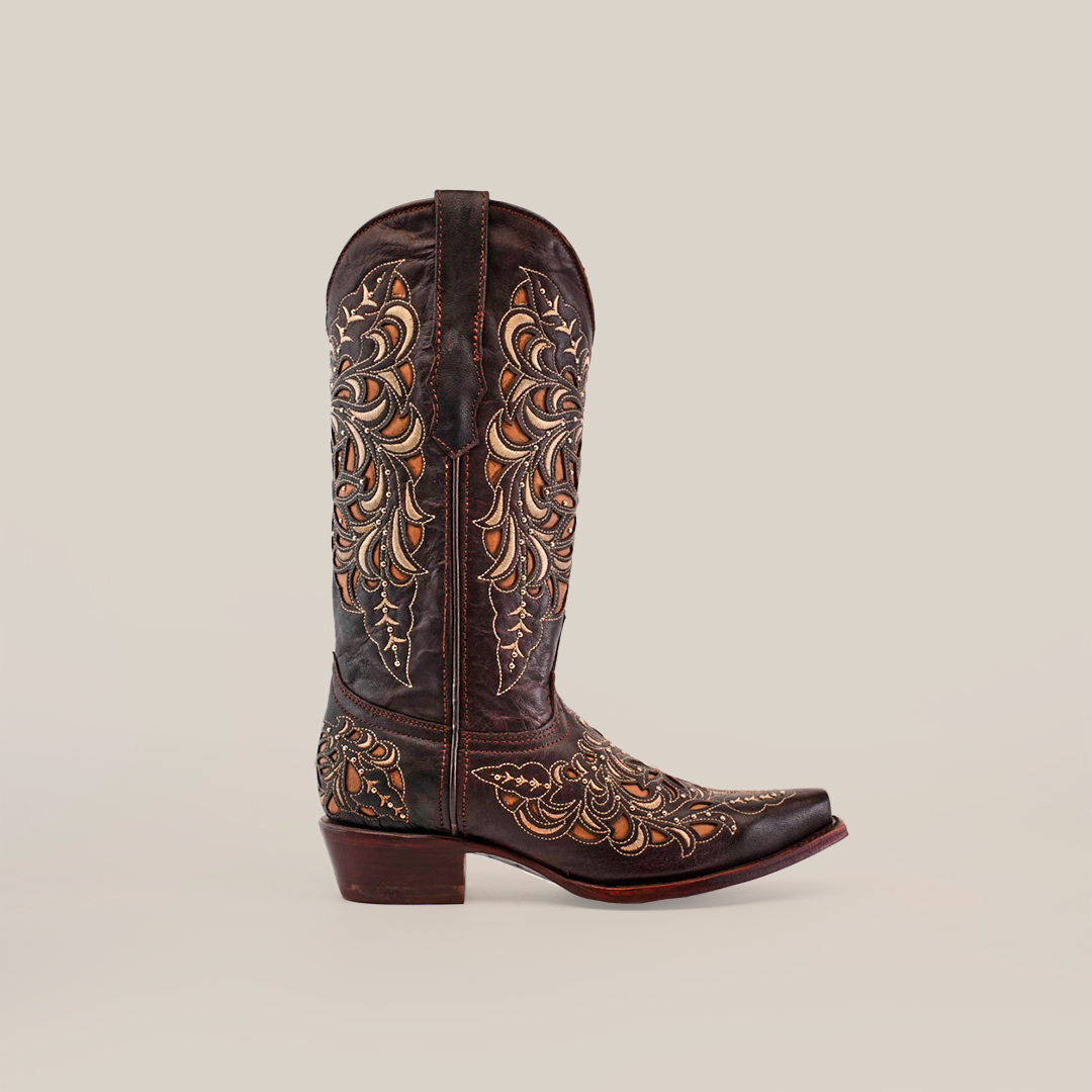 The Kiara Crystals Chocolate boot, displayed solo on a white background, is dark brown with intricate gold and tan floral embroidery. This mid-shaft western footwear features a snip toe and solid heel, showcasing the exquisite craftsmanship of handcrafted boots.