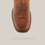 Close-up of the Tan Brown Rough out - Waterproof - Soft Toe boot featuring intricate toe cap stitching. This handcrafted design includes a square toe, patterned sole with white edge stitching, and premium slightly distressed cowhide leather.