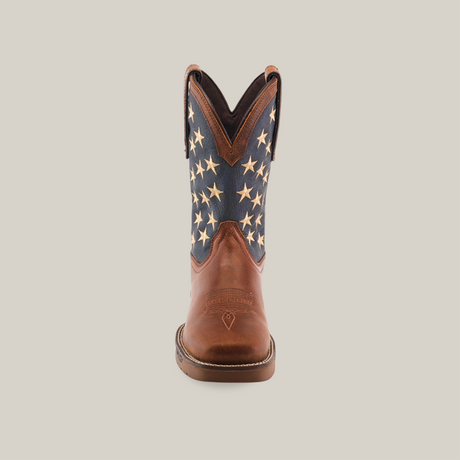 Front view of a Navy Brown US Flag boot features a brown leather foot and blue shaft with white stars, crafted from premium cowhide leather. Its centered on a white background, highlighting its western style and rugged durability typical of waterproof, quality work boots.