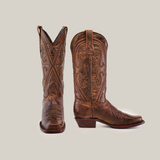 The Piola Tabaco - Mid Shaft - Narrow Square Toe boots, made from premium brown leather with intricate stitching and patterns, are shown from the front and side. These cowboy boots feature pull straps and a slightly angled heel, all set against a plain white backdrop.