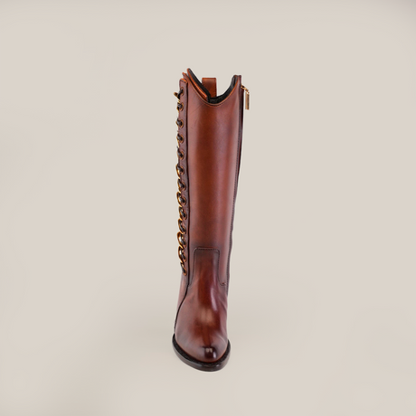 The Francia Rings Tall Shaft Tan - J Toe boot, crafted from premium leather with decorative side chain detail, is set against a white background. It features a sleek design with a visible side zipper and high shine finish, part of the exclusive Platinum Collection.