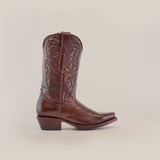 The Plane Jane Moka - Short Shaft - Snip Toe boot is elegantly handcrafted from premium brown leather, showcasing intricate stitching and a pointed toe. It radiates Western aesthetics with its mid-calf height and chunky heel, set against a plain white background.