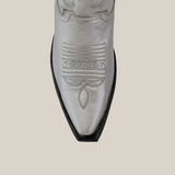 Close-up of the pointed toe on a Brittany Silver–Tall Shaft–Snip Toe Boot, highlighting intricate stitching on premium leather against a plain gray background.