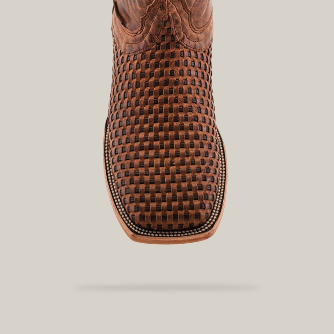 The Texas Basket Weave Orix - Square Toe boot, made from premium brown cowhide leather, features intricate stitching and a textured vamp, showcased against a plain white background.