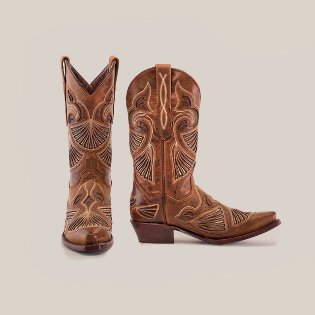 A pair of Shan Camel Short Shaft boots, featuring a snip toe and crafted from premium leather with detailed stitching. One boot stands upright while the other is angled to the side, displaying their stacked heels, all set against a white background.