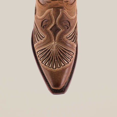 The Shan Camel - Short Shaft - Snip Toe boots, made from premium brown leather, showcase intricate toe stitching and embroidery, embodying Western footwears essence against a simple white backdrop.