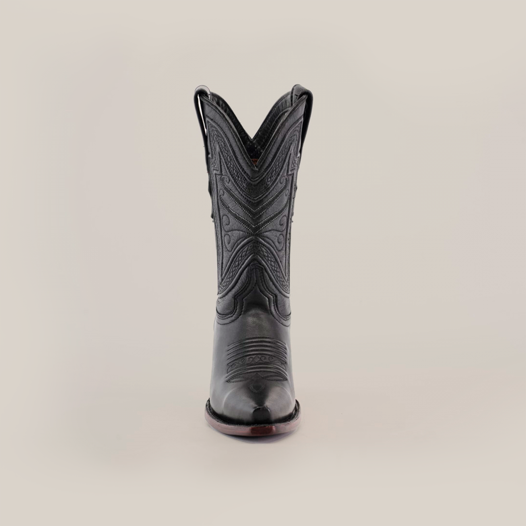 The Plane Jane Black Short Shaft Snip Toe cowboy boot, made from premium leather, stands against a white backdrop. Its intricate stitching on the front and toe highlights classic Western artistry.