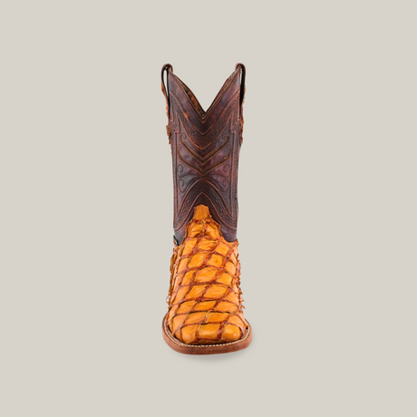 Front view of the Exotic Piraruco Fish - Brandy - Square Toe boot, showcasing a textured light brown pirarucu leather toe and intricate dark brown stitching on the shaft, set against a plain backdrop.