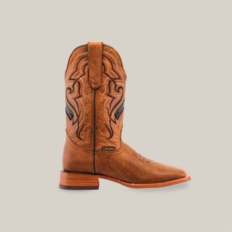 The Wild Mustard - Square Toe boot boasts intricate shaft stitching and a pull tab, highlighting premium cowhide craftsmanship. It features a square toe, genuine leather sole, and is showcased against a plain white background.